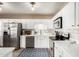Updated kitchen featuring stainless steel appliances, subway tile backsplash, and ample cabinet space at 4539 N 9Th Ave, Phoenix, AZ 85013