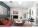 Relaxing living room offers a brick fireplace, comfortable seating, and backyard access at 4539 N 9Th Ave, Phoenix, AZ 85013