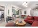 Bright living room with modern lighting and an open layout to the dining and kitchen at 4539 N 9Th Ave, Phoenix, AZ 85013