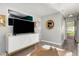 Cozy living area showcases a modern media center, wood-look flooring, and contemporary design at 4539 N 9Th Ave, Phoenix, AZ 85013