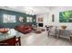 Inviting living room features a brick fireplace, modern lighting, and stylish decor at 4539 N 9Th Ave, Phoenix, AZ 85013