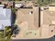 Aerial view of a home showing the roof, landscaping, and proximity to surrounding neighborhood at 5142 E Edgewood Cir, Mesa, AZ 85206