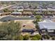 A high view shows a home with brick patio and desert landscaping in a well-planned neighborhood at 5142 E Edgewood Cir, Mesa, AZ 85206