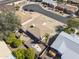 An aerial view shows a home with a backyard patio, desert landscaping and proximity to local streets at 5142 E Edgewood Cir, Mesa, AZ 85206