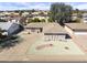 Charming home featuring desert landscaping, a curved driveway, and a well-maintained front yard at 5142 E Edgewood Cir, Mesa, AZ 85206