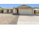 Charming single-story home featuring a two-car garage and low-maintenance desert landscaping at 519 W Palomino Dr, Chandler, AZ 85225
