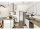 Open-concept kitchen featuring granite countertops and stainless steel appliances at 519 W Palomino Dr, Chandler, AZ 85225