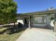 The covered patio features a seating area and provides shade and respite from the sun at 519 W Palomino Dr, Chandler, AZ 85225