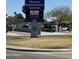 Sign for Sirrine Montessori Center in Mesa, AZ with contact information and details at 519 W Palomino Dr, Chandler, AZ 85225