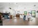 Bright living room with modern open floor plan, stylish furnishings, and open to the kitchen at 521 W Cambridge Ave, Phoenix, AZ 85003