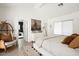 Bright and spacious main bedroom features vaulted ceilings and a view to the ensuite at 521 W Cambridge Ave, Phoenix, AZ 85003