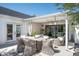 Spacious covered patio with dining and seating areas, perfect for outdoor entertaining and relaxation at 521 W Cambridge Ave, Phoenix, AZ 85003