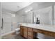 Bathroom features a shower, toilet, and vanity at 5342 S Farmer Ave, Tempe, AZ 85283
