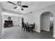 Open dining area with modern lighting, tile floors, and easy access to other living spaces at 5342 S Farmer Ave, Tempe, AZ 85283