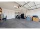 Garage featuring storage and a motorcycle at 5342 S Farmer Ave, Tempe, AZ 85283