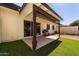 Covered patio with artificial grass at 5342 S Farmer Ave, Tempe, AZ 85283