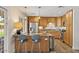 Well-equipped kitchen with stainless steel appliances, granite countertops, and custom cabinetry at 7254 E Vernon Ave, Scottsdale, AZ 85257