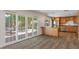 Open layout seamlessly connects the living room to the outdoor patio and modern kitchen at 7254 E Vernon Ave, Scottsdale, AZ 85257