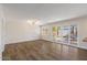 Spacious living room featuring neutral walls and sliding glass doors to the outdoor patio at 7254 E Vernon Ave, Scottsdale, AZ 85257