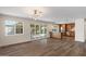 Bright living space flows into the kitchen, with luxury vinyl flooring and abundant natural light at 7254 E Vernon Ave, Scottsdale, AZ 85257