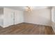 Open living room with luxury vinyl floors, closet storage, and lots of natural light at 7254 E Vernon Ave, Scottsdale, AZ 85257