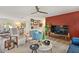 Comfortable living room with stylish furniture, ample natural light, and seamless flow to other areas at 7254 E Vernon Ave, Scottsdale, AZ 85257