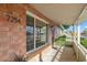 View of front porch and manicured shrubs, with the house number 7254 clearly displayed at 7254 E Vernon Ave, Scottsdale, AZ 85257