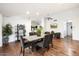 Dining room features a modern table, stylish seating, and hardwood floors, perfect for entertaining guests at 7471 E Desert Vista Rd, Scottsdale, AZ 85255