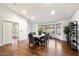 This dining room has a long table, modern furnishings, and an open layout with natural light at 7471 E Desert Vista Rd, Scottsdale, AZ 85255