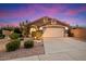 Charming single-story home with a well-maintained yard and attached two-car garage at 7471 E Desert Vista Rd, Scottsdale, AZ 85255
