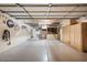 Spacious garage with overhead storage and custom cabinets, perfect for organization at 7471 E Desert Vista Rd, Scottsdale, AZ 85255