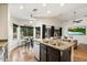 Bright kitchen with granite countertops, stainless steel appliances, and an open layout to the living area at 7471 E Desert Vista Rd, Scottsdale, AZ 85255