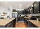 Spacious kitchen featuring stainless steel appliances, stone countertops, and lots of prep space at 7471 E Desert Vista Rd, Scottsdale, AZ 85255