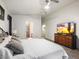 Spacious main bedroom with soft carpeting, natural light, and a TV for relaxation at 7471 E Desert Vista Rd, Scottsdale, AZ 85255