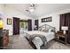Comfortable main bedroom featuring neutral tones, slider to patio, and modern decor at 7471 E Desert Vista Rd, Scottsdale, AZ 85255