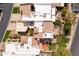 Bird's eye view of a property's backyard with outdoor seating, landscaping, and mature trees at 8100 E Camelback Rd # 138, Scottsdale, AZ 85251