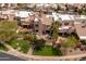 Aerial view of a home with a private backyard, lush landscaping, and an outdoor seating area at 8100 E Camelback Rd # 138, Scottsdale, AZ 85251