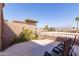 Wide angle shot of a balcony featuring lounge seating with neutral toned railings and walls at 8100 E Camelback Rd # 138, Scottsdale, AZ 85251