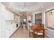 Bright kitchen with white cabinets, quartz countertops, and a breakfast nook at 8100 E Camelback Rd # 138, Scottsdale, AZ 85251