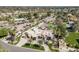 Stunning aerial view shows desert landscaping, green spaces, and serene neighborhood at 8817 N 58Th Pl, Paradise Valley, AZ 85253