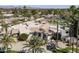 Aerial view of the property, showcasing its desert landscaping, layout, and proximity to surrounding area at 8817 N 58Th Pl, Paradise Valley, AZ 85253