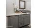 Powder room with granite countertop, vessel sink, and decorative mirror at 8817 N 58Th Pl, Paradise Valley, AZ 85253