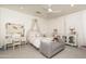 Charming bedroom features a decorative bed frame and a cozy seating area for relaxation at 8817 N 58Th Pl, Paradise Valley, AZ 85253