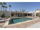 Backyard swimming pool and lounge area with diving board surrounded by beautiful desert landscaping at 8817 N 58Th Pl, Paradise Valley, AZ 85253