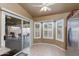 Cozy breakfast nook featuring a bay window and sliding door leading to the outdoor patio at 8942 W Sequoia Dr, Peoria, AZ 85382