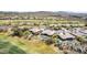 Backyard features a putting green and pool nestled within a vibrant desert community near a golf course at 9440 N Sunset Rdg, Fountain Hills, AZ 85268