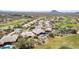 A desert neighborhood with lush greenery around a golf course with mountains in the distance at 9440 N Sunset Rdg, Fountain Hills, AZ 85268