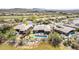 Premium home with pool, putting green, outdoor seating, desert landscaping, and mountain views at 9440 N Sunset Rdg, Fountain Hills, AZ 85268