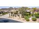 Stunning exterior elevation showcasing a well maintained desert landscape, and a three car garage at 9440 N Sunset Rdg, Fountain Hills, AZ 85268