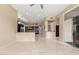 Open-concept living space with marble floors seamlessly connecting to a modern kitchen area at 9440 N Sunset Rdg, Fountain Hills, AZ 85268